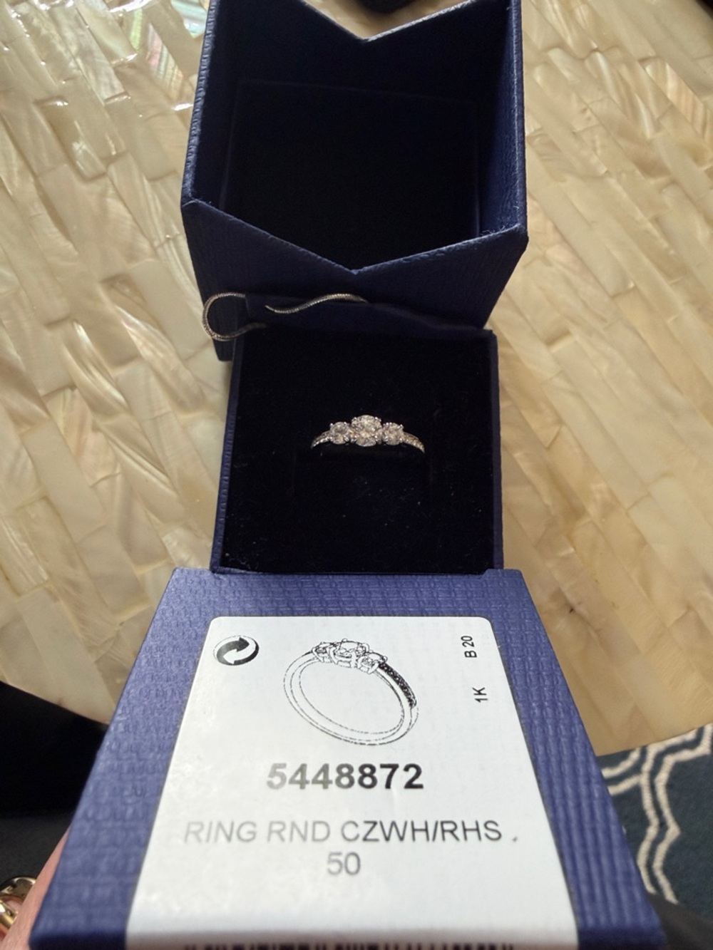 Swarovski “Attract Trilogy” rhodium plated three stone ring size 50